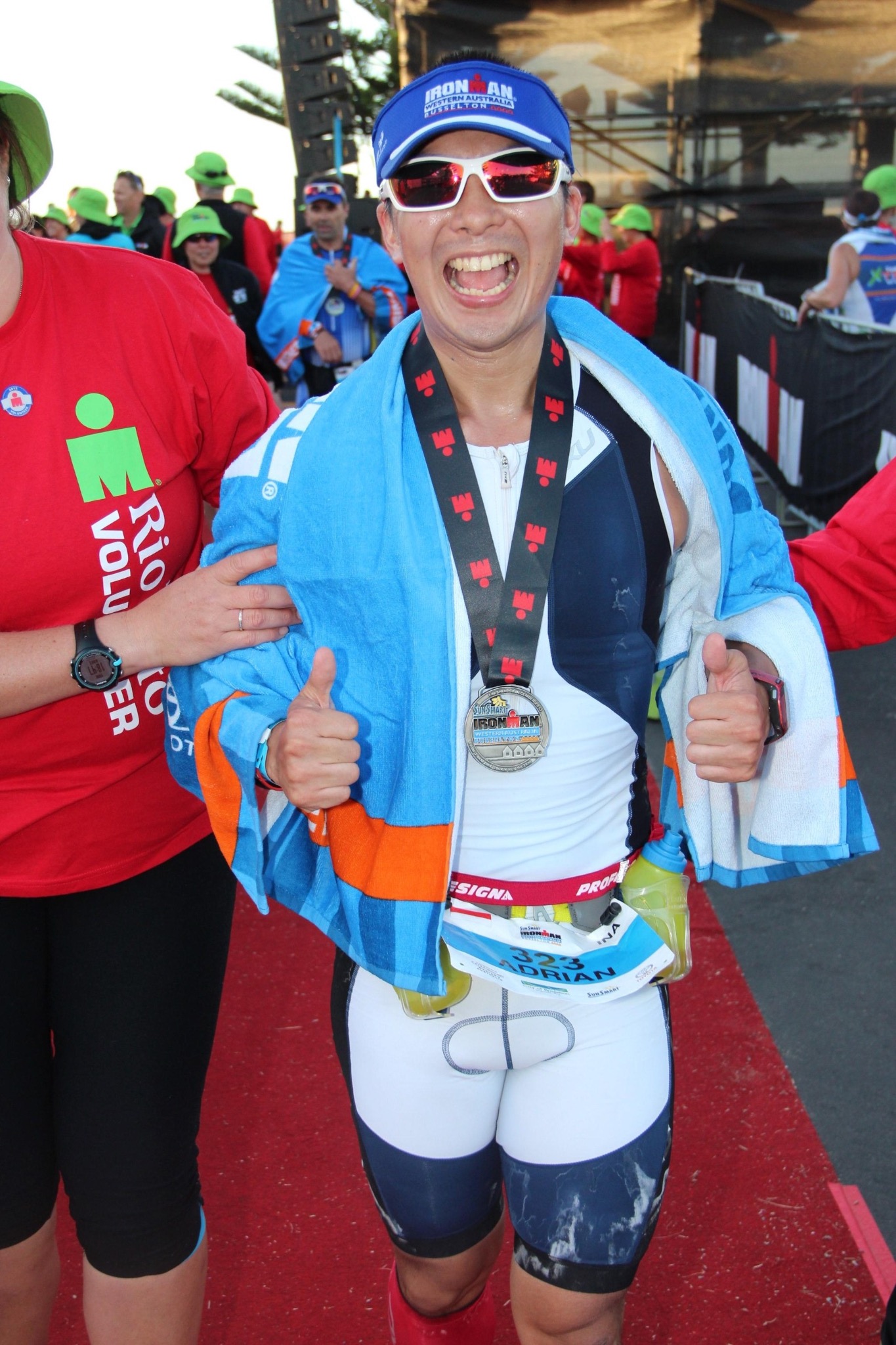 Adrian Li at Ironman finish line