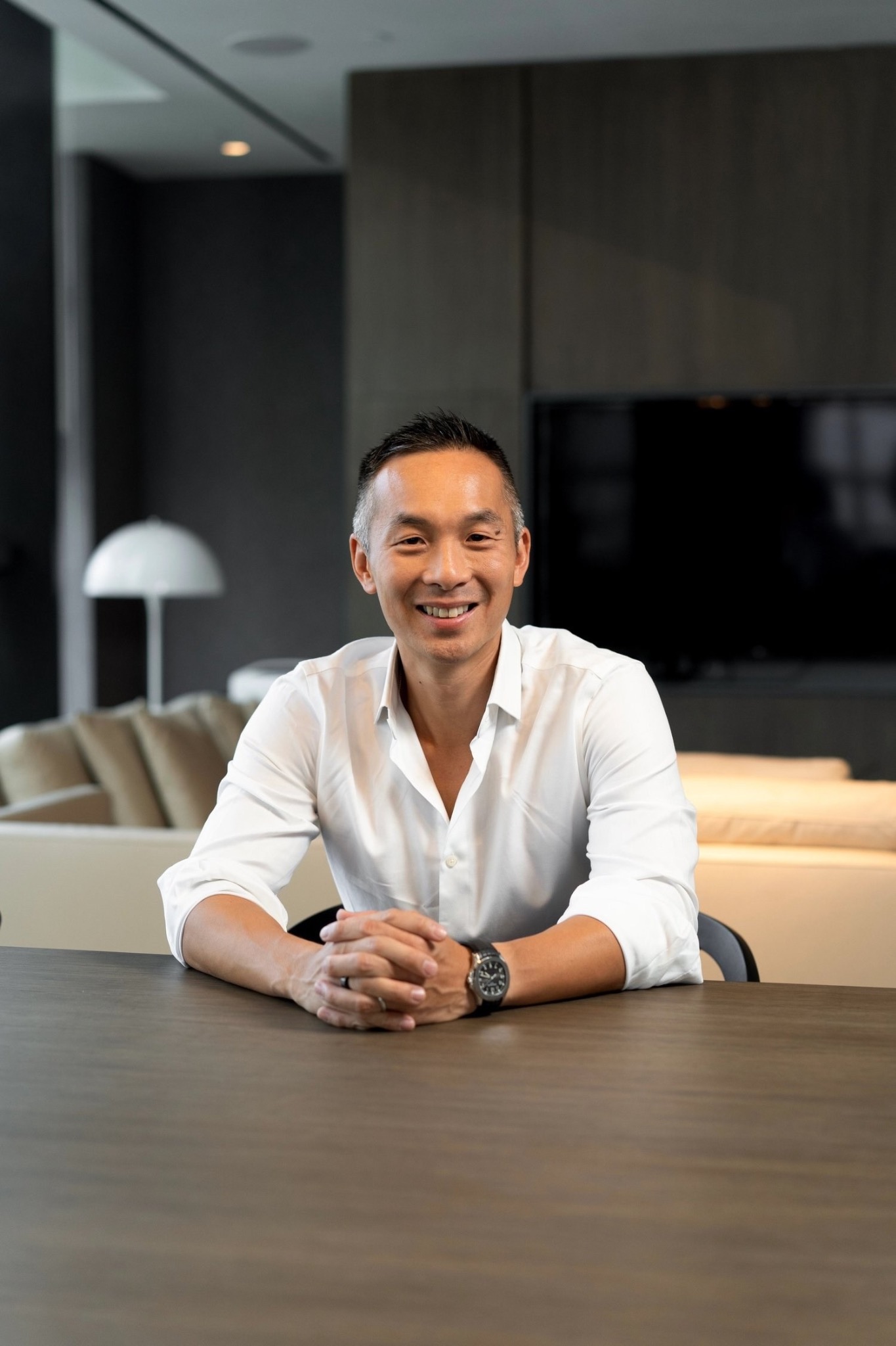 Adrian Li seated portrait